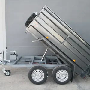 Remolque basculante hidráulico de 2 ejes con soporte lateral – Ruedas en el exterior